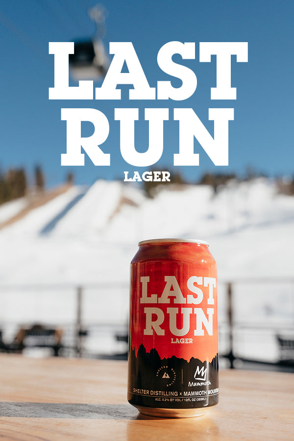 Cheers on the Main Lodge deck at Mammoth Mountain Ski Resort. A collaboration beer with Shelter Distilling and Mammoth Mountain. 